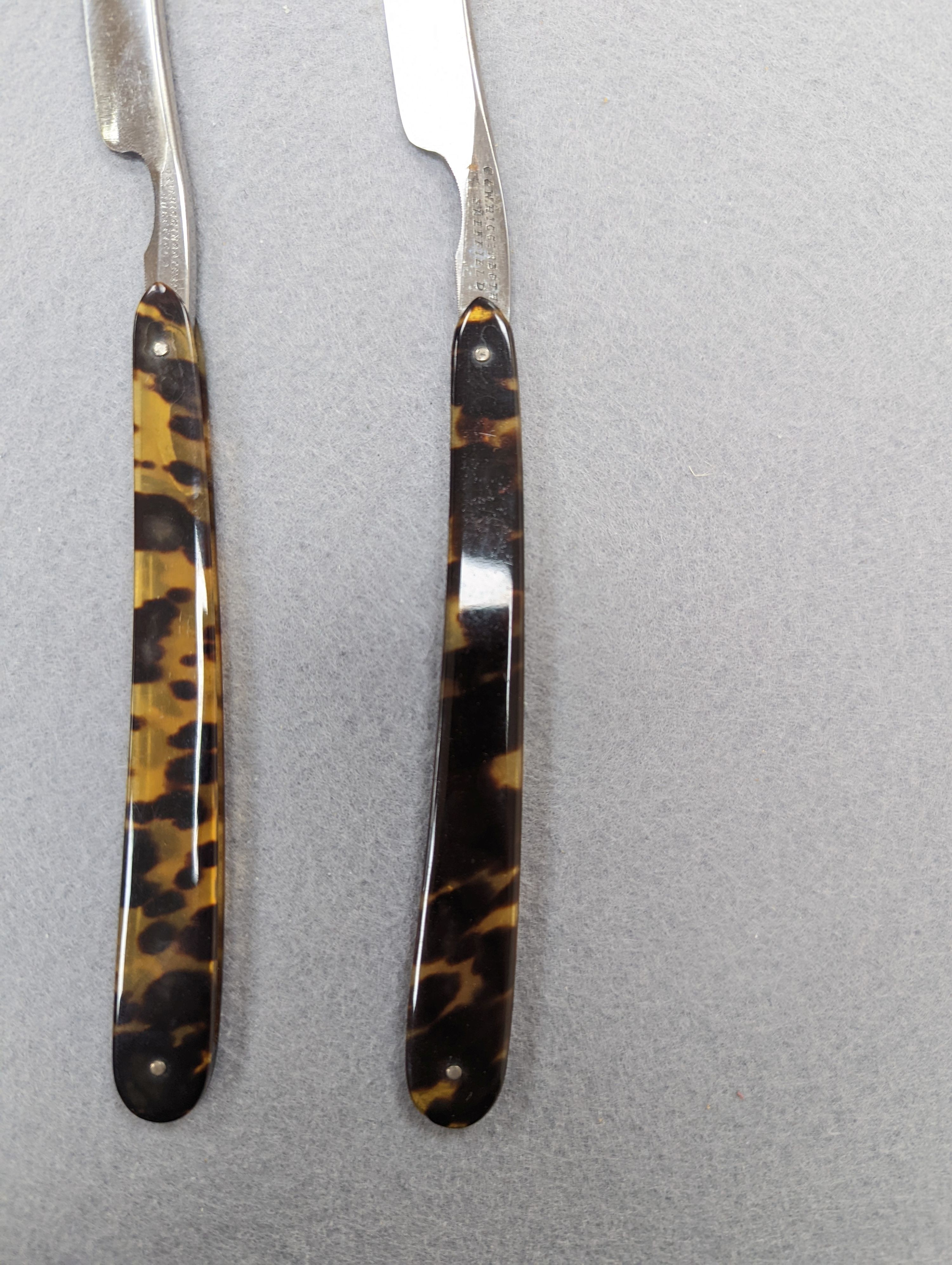 A set of seven tortoiseshell handled cut throat razors for the days of the week Wilkinson and a cased pair of tortoiseshell handled razors, C&W Higginbottom